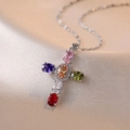 Colorful gemstone cross necklace with zircon crystals on premium silk fabric background - Steel Color Colorful Cross Pendant Necklace / Steel / Colored Zircon