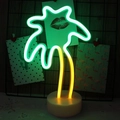 Neon LED coconut tree lamp with green crown and yellow trunk on a round base - Bicolor Coconut Tree