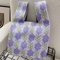 Minimalistische lavendel gebreide tas met paars bloemenpatroon en groene bladeren - Lavendelpaars