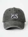 Détail de la broderie de raton laveur sur casquette de baseball vintage en coton délavé gris - Noir