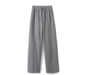 Détail du pantalon large en maille grise avec taille élastique à cordon et coutures verticales - S / Pantalon large / gris foncé