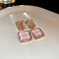 Elegant square pink purple crystal earrings with gold finish on a white ceramic tray - Silver Earring Post - Pink