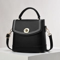 Classic black lychee grain trapezoid handbag with gold hardware and white bead accents - Black