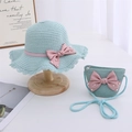 Detail of mint green straw hat and matching mini bag set with pink bows and pearls - Mint Green