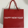 Red Happy New Year gift bag with red woven rope handles for festive packaging - New Year Handbag 22*20*6cm