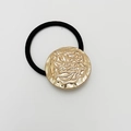 Golden round metal hair tie with irregular texture on a black elastic band for women - Matte Rose Gold - Linear Round