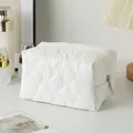 White quilted floral cosmetic bag with silver zipper and spacious portable structure - Irregular Quilted White