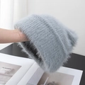 Close-up of light gray fuzzy knit beanie showing soft long plush fibers and ribbed texture - Stretchy / Gray