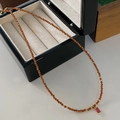 Tiger eye beaded necklace with a pink gemstone pendant in a vintage gold-toned setting - Rhodochrosite Necklace XL0389