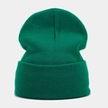 Detailed close-up of green knitted beanie showing premium fine ribbed texture and wide fold - Malachite green