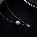 Elegant S925 silver necklace featuring a white pearl and a diamond-studded K pendant - Letter K