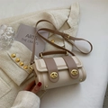 Elegante borsa a cilindro crema e marrone con chiusure girevoli in metallo dorato - Cachi