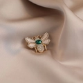 Elegant gold bee brooch with green gemstone and white enamel on champagne satin - 529# Bee
