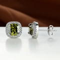 Macro shot of square emerald zircon halo stud earrings with silver metal backing - Olive Green
