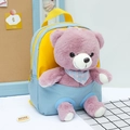 Blue and yellow contrast children's backpack with a purple teddy bear in the front pocket - Blue