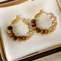 Detailed close-up of gold hoop earrings with tiger's eye stone and crystals in a jewelry box - Silver Earring Post - Coffee