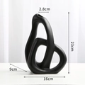 Vaso astratto in ceramica nera con design circolare cavo per decorazioni artistiche - Nero Grande