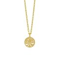 Detailed shot of golden Libra constellation necklace with hollow pendant and zircon stone - Libra