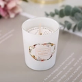 Minimalist white glass jar scented candle with floral label and dust cover protection - Green Tea & Orange Blossom