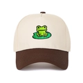 Detail of embroidered green frog on lily pad on cream and brown trucker hat - Off-White and Dark Brown