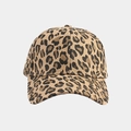 Detailed view of leopard print cotton twill fabric and curved brim on baseball cap - Khaki Leopard Print