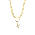 Double-layered gold chain necklace with pearl-encrusted letter X pendant on white background - Letter X