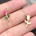 Pink enamel rose flower alloy pendant with green leaves shown in palm for DIY jewelry - 1Pc Rose Red Rose 9x18mm