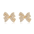 18K gold-plated bow earrings with clear zircons on a white background with reflection - Classic Dense Zirconia Bow