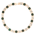 Detail view of tennis bracelet featuring alternating green and white cubic zirconia stones - Green (1079)