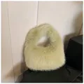Pistachio green plush faux fur mini tote bag with soft fluffy handle for winter - Light Green