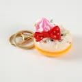 Mini macaron dessert keychain with cream icing, bow detail, and gold hardware - D11 White - Gold 8-clasp