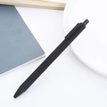Bolígrafo de gel retráctil negro mate sobre un escritorio de estilo minimalista - Negro