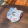 Light blue polka dot hair scrunchie with red piping and embroidered Keep Love label - Blue Scrunchie with Red Trim and Red Polka Dots