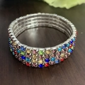 Elegant four-row stretch bracelet with vibrant multi-color crystals and alloy base - 4 Row Silver Colorful Rhinestone Bracelet