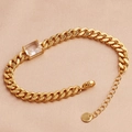 Detail of gold-plated Cuban chain bracelet with a rectangle zircon on silk background - 18K Gold / White Zircon