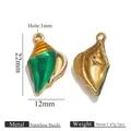 Stainless steel seashell charm variant measuring 22mm by 12mm for DIY jewelry making - Green Conch
