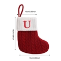Red knit Christmas stocking featuring white cuff with red embroidered letter U and dimensions - Letter U