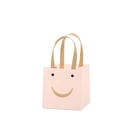 Pink paper gift bag with smiley face print and kraft paper handles for parties - Smiley Style / Pink / 12*12*12cm