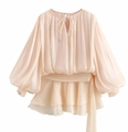 Detailed view of beige long sleeve chiffon top featuring puff sleeves and ruffled hem - Apricot Dress