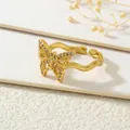 Detailed macro view of 18K gold butterfly ring featuring sparkling zircon inlay accents - Gold Butterfly (White Zirconia)