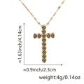Gold cross necklace featuring black zircon hearts with detailed size and weight specs - Style L (Heart Spliced Cross/Black Zirconia)