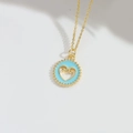 Collana sole dorata con bordo in smalto celeste e pendente a cuore cavo al centro - Cuore Azzurro (XL3349-6)