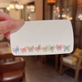 Juego de ocho pendientes de mariposa con degradado colorido en tarjeta blanca - Juego de Pendientes de Botón de Mariposa con Degradado de Colores (A777彩)