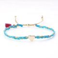 Sky blue and gold braided friendship bracelet with a polished gold heart charm - Sky Blue and Gold (with Red Tassel)