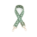 Détail de la bandoulière tissée vert et blanc avec attaches en métal doré poli - Quincaillerie Dorée / Vert