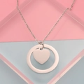 Polished stainless steel ring and heart pendant detail on a silver-toned O-chain necklace - Steel