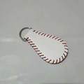 White faux leather baseball keychain featuring realistic red hand-stitched details - White Baseball Shape Keychain (#3)