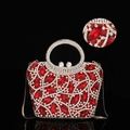 Macro shot of luxury red crystal clutch bag with metal frame and diamond embellishments - 15x14 Navette Handheld Red