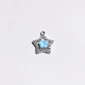 Detail of silver star pendant with blue flower center and sparkling rhinestones - Blue