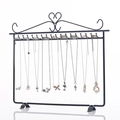 Black iron heart-shaped jewelry display stand with multiple hooks for necklaces - Black